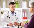 Doctor consulting with patient